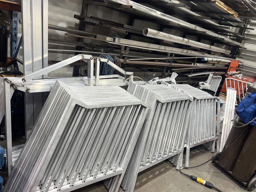 Finished aluminum railing panels stacked ready for delivery
